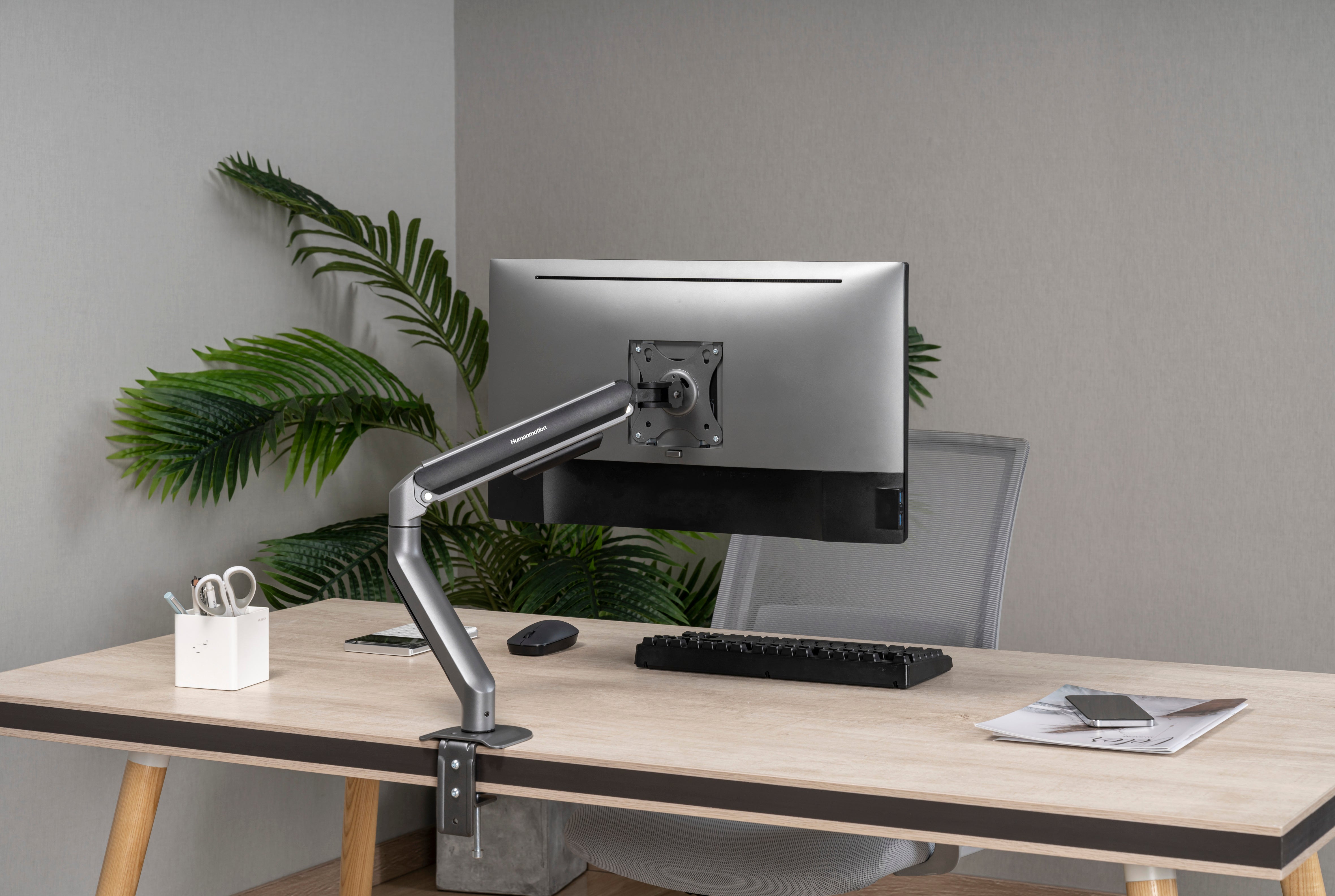 Arm màn hình công thái học gắn bàn giúp tối ưu workspace setup và thay thế chân đế zin màn hình